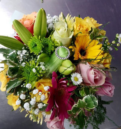 Tropical Rainbow - Choice cut flowers may be presented as a handtied or in a vase in stunning seasonal and vibrant shades. Avail Johannesburg only - suitable for all occasions and always well received