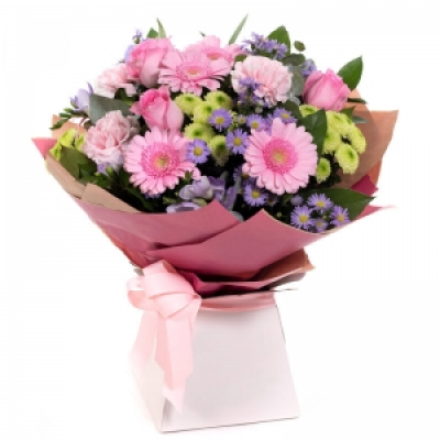 Warm Wishes - Send this vibrant hand-tied featuring a mix of favourite flowers delivered in a delightful gift bag or box is the perfect way to send your thoughts.
