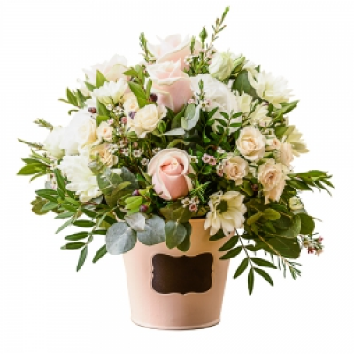 Dawn - An inspiration from nature . A flower gift perfectly arranged in a container using pale shaded flowers and foliage.
