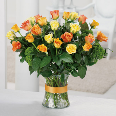 Mixed Roses - A selection of choice fresh roses that say you care in a variety of colours and arranged in a glass vase with seasonal greens. Ideal for all occasions and always well received